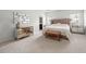 Primary bedroom with mirrored dresser and nightstands at 7644 Rudder Cir, Fairburn, GA 30213