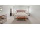 Primary bedroom showcasing a unique headboard and mirrored nightstands at 7644 Rudder Cir, Fairburn, GA 30213