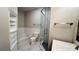 Bright bathroom with soaking tub, separate shower, and built-in storage at 793 Inman Mews Ne Dr, Atlanta, GA 30307