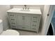 Bathroom vanity with white countertop, new cabinets, and modern fixtures at 793 Inman Mews Ne Dr, Atlanta, GA 30307