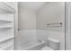 Bright bathroom with jetted tub, and tile half wall at 793 Inman Mews Ne Dr, Atlanta, GA 30307