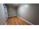 This secondary bedroom offers great natural light and beautiful wood-look floors at 793 Inman Mews Ne Dr, Atlanta, GA 30307