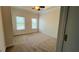 Cozy bedroom with carpet flooring, ceiling fan, and natural light at 793 Inman Mews Ne Dr, Atlanta, GA 30307