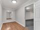 Versatile bonus room features hardwood floors, recessed lights, and a door leading to the garage at 793 Inman Mews Ne Dr, Atlanta, GA 30307