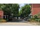 Gated community entrance showcasing lush landscaping, providing privacy and security at 793 Inman Mews Ne Dr, Atlanta, GA 30307
