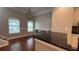 Charming dining room featuring hardwood floors, ample natural light, and a view of the kitchen at 793 Inman Mews Ne Dr, Atlanta, GA 30307
