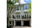 Townhome with bay windows, French doors to a terrace, and garage parking at 793 Inman Mews Ne Dr, Atlanta, GA 30307