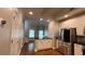 Open-concept kitchen with stainless steel appliances, breakfast bar, and hardwood floors at 793 Inman Mews Ne Dr, Atlanta, GA 30307