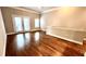 Cozy living area with hardwood floors, providing access to a private balcony at 793 Inman Mews Ne Dr, Atlanta, GA 30307