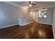 Bright living room with hardwood floors, offering a seamless transition to the kitchen area at 793 Inman Mews Ne Dr, Atlanta, GA 30307