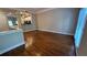 Spacious living room with hardwood floors and a view into the kitchen, perfect for entertaining at 793 Inman Mews Ne Dr, Atlanta, GA 30307