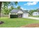 Charming single-story house with a well-maintained lawn and driveway leading to an attached garage at 15 Echota Ne Rd, Cartersville, GA 30121