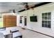 Back yard with a patio offering an outdoor tv, comfortable seating, and a privacy wall for relaxation at 15 Echota Ne Rd, Cartersville, GA 30121