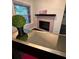 Cozy living room nook with a unique electric fireplace at 220 Renaissance Ne Pkwy # 2220, Atlanta, GA 30308