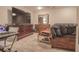Bedroom with dark wood dressers, tv, and a desk at 25 Nunnally Pl, Villa Rica, GA 30180