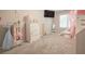Spacious bedroom with plush carpet, ample closet space, and neutral colored walls at 25 Nunnally Pl, Villa Rica, GA 30180
