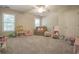 Multi-purpose bonus room features bright lighting, neutral paint, plush carpet, and ample floor space at 25 Nunnally Pl, Villa Rica, GA 30180