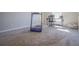 Versatile bonus room featuring bright lighting, neutral walls, and an exercise area at 25 Nunnally Pl, Villa Rica, GA 30180