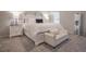 Bright main bedroom with plush carpet, white furniture, and a large window for natural light at 25 Nunnally Pl, Villa Rica, GA 30180