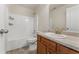 Bathroom featuring a vanity with one sink, cabinets, and a shower-tub combo at 5960 Castlegate Dr, Douglasville, GA 30135