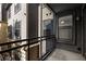 View from the balcony showcasing the building's exterior, neutral color scheme and architectural details at 400 17Th Nw St # 2308, Atlanta, GA 30363