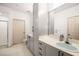 Bright bathroom offers a stand up shower, stylish vanity, and tiled floors at 400 17Th Nw St # 2308, Atlanta, GA 30363