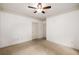Cozy bedroom features neutral carpet, a ceiling fan and ample natural light at 400 17Th Nw St # 2308, Atlanta, GA 30363