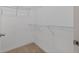 Walk-in closet with built-in wire shelving for optimal storage and organization at 400 17Th Nw St # 2308, Atlanta, GA 30363