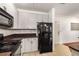 Open concept kitchen with easy access to other rooms in the home at 400 17Th Nw St # 2308, Atlanta, GA 30363
