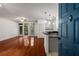 Open concept living room with wood floors and easy access to the updated kitchen at 400 17Th Nw St # 2308, Atlanta, GA 30363