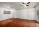 Bright living room features hardwood floors, recessed lighting and a stylish ceiling fan at 400 17Th Nw St # 2308, Atlanta, GA 30363