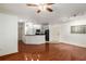 Living room and kitchen combo with hardwood floors and neutral paint at 400 17Th Nw St # 2308, Atlanta, GA 30363