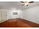 Bright living room features hardwood floors, recessed lighting and a stylish ceiling fan at 400 17Th Nw St # 2308, Atlanta, GA 30363