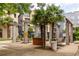 Beautiful community pool area featuring seating, shade umbrellas and palm trees at 400 17Th Nw St # 2308, Atlanta, GA 30363