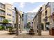 Relaxing community pool area with comfortable seating, shade, and stylish architectural details at 400 17Th Nw St # 2308, Atlanta, GA 30363