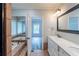 Ensuite bathroom featuring a tub and walk-in shower, as well as a large window, awaiting renovation at 402 John Tate Nw Rd, Acworth, GA 30102