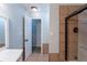 A bathroom featuring a walk-in shower with tile surround and a vanity with cabinet at 402 John Tate Nw Rd, Acworth, GA 30102