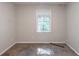 Cozy bedroom featuring a window and neutral carpet at 402 John Tate Nw Rd, Acworth, GA 30102