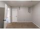 Bedroom with carpet, walls, and open doorway at 402 John Tate Nw Rd, Acworth, GA 30102