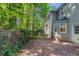 View of the backyard, deck, and exterior elevation of this traditional home at 402 John Tate Nw Rd, Acworth, GA 30102