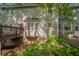The back exterior of this house features bay windows and large windows to bring the outdoors in at 402 John Tate Nw Rd, Acworth, GA 30102