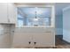 Open kitchen featuring a pass through window with views of the living area and fireplace at 402 John Tate Nw Rd, Acworth, GA 30102