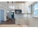 Kitchen featuring modern appliances and classic white cabinetry awaiting your design and renovation at 402 John Tate Nw Rd, Acworth, GA 30102