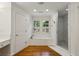 Bathroom features a soaking tub with window view, and glass-enclosed shower at , Dunwoody, GA 30338