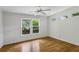 Bright bedroom with hardwood floors, neutral walls, with natural light streaming through multiple windows at , Dunwoody, GA 30338