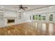 Spacious living room featuring hardwood floors, a fireplace with built-ins, and ample natural light at , Dunwoody, GA 30338