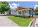 Lovely blue home with a quaint front porch, ceiling fans, and a well-kept lawn at 496 Rankin Ne St, Atlanta, GA 30308
