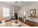 Inviting living room featuring hardwood floors, a modern ceiling fan, and stylish decor at 496 Rankin Ne St, Atlanta, GA 30308