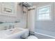 Clean and bright bathroom featuring white subway tile and modern fixtures at 657 E Paces Ferry Ne Rd, Atlanta, GA 30305