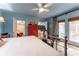 Cozy bedroom with French doors, a ceiling fan, and plenty of natural light at 657 E Paces Ferry Ne Rd, Atlanta, GA 30305